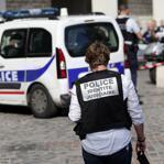 A woman, right, stood by a security perimeter near the site where six soldiers of the anti-terrorism Sentinelle operation were hit by a car in Levallois-Perret, near Paris, France.