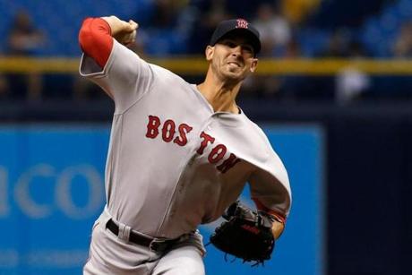 ST. PETERSBURG, FL - AUGUST 9: Rick Porcello #22 of the Boston Red Sox pitches during the first inning of a game against the Tampa Bay Rays on August 9, 2017 at Tropicana Field in St. Petersburg, Florida. (Photo by Brian Blanco/Getty Images)
