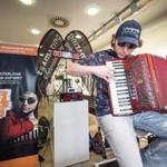 Cory Pesaturo played the accordion in a store window for more than 32 hours, in an attempt to set a new world record. 