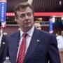 FILE - In this July 18, 2016 file photo, then-Trump campaign chairman Paul Manafort walks around the convention floor before the opening session of the Republican National Convention in Cleveland. A spokesman for President Donald Trump?s former campaign chairman, Paul Manafort, says that FBI agents served a search warrant at one of his homes. (AP Photo/Carolyn Kaster, File)