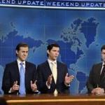 This August 10, 2017, photo provided by NBC shows Alex Moffat as Eric Trump, left, Mikey Day as Donald Trump Jr., center, and Colin Jost on set during the debut episode of 