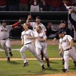 10-27-2004:St. Louis,MO:GLOBE STAFF PHOTO/STAN GROSSFELD- Red Sox players storm the field after winning the World Championship. Library Tag 10292004 Sports- 2004 World Champions Boston Red Sox