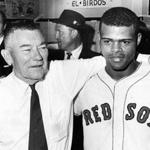 Boston, MA - 10/11/1967: Boston Red Sox owner Tom Yawkey, left, stands with Red Sox player Reggie Smith after the Red Sox defeated the St. Louis Cardinals in Game 6 of the World Series at Fenway Park in Boston on Oct. 11, 1967. The Red Sox forced a Game 7 by winning, 8-4. (Frank O'Brien/Globe Staff) --- BGPA Reference: 170322_MJ_041