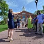 Junior Jackie Emmons of Boxford (left) led prospective students, including Cedane Richards of Hartford (right), on a tour at Bentley University.