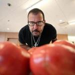 Richard Ansara, chef-owner of Tresca, studied the heirloom tomatoes while judging Tuesday at the Massachusetts Tomato Contest.