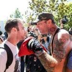 An alt-right No-To-Marxism rally attendee, right, is confronted by a counter protestor on Sunday at Martin Luther King Jr. Civic Center Park in Berkeley, California. 