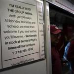 Bernie & Phyl?s advertisement on a subway car on Monday.