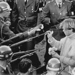 Antiwar demonstrators approach MPs blocking the Pentagon in 1967 in a scene from Ken Burns and Lynn Novick?s ?The Vietnam War.?