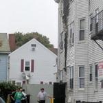 Damage from the three-alarm fire was visible on Saturday.