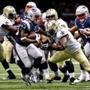 Aug 22, 2015; New Orleans, LA, USA; New England Patriots running back Dion Lewis (33) breaks away from New Orleans Saints linebacker Jerry Franklin (54) for a touchdown during the second half of a preseason game at the Mercedes-Benz Superdome. The Patriots defeated the Saints 26-24. Mandatory Credit: Derick E. Hingle-USA TODAY Sports