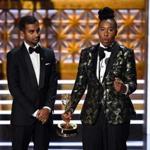 Aziz Ansari (left) and Lena Waithe accepted outstanding writing for a comedy series for 'Master of None' (episode 'Thanksgiving').