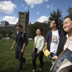 17toronto - A group of students new to The University of Toronto walk across the lawn in front of King's College at the U of T at the conclusion of a campus tour for foreign students lead by volunteers from the university's Centre for International Experience in Toronto, ON on Friday, September 8, 2017. (Peter Power for the Boston Globe)