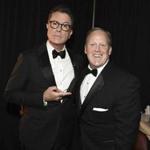 Stephen Colbert, left, and Sean Spicer posed backstage at the Emmy Awards on Sunday.