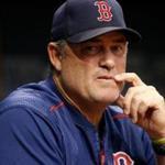 ST. PETERSBURG, FL - SEPTEMBER 15: Manager John Farrell #53 of the Boston Red Sox looks on from the dugout during the third inning of a game against the Tampa Bay Rays on September 15, 2017 at Tropicana Field in St. Petersburg, Florida. (Photo by Brian Blanco/Getty Images)