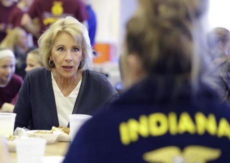 US Secretary of Education Betsy DeVos spoke with Gracie Johnson during a hog roast in Charlottesville, Indiana.
