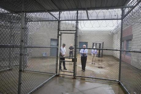 NORTH DARTMOUTH, MA-Inside view from the exercise cage (Hodgson calls it a pen) at the Bristol County House of Corrections where Aaron Hernandez exercises for an hour per day. Sheriff Thomas Hodgson is third from the left.
