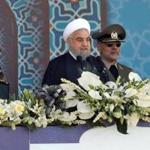 Iranian President Hassan Rouhani sits among senior army staff as he delivers his speech during the annual military parade marking the anniversary of the outbreak of its devastating 1980-1988 war with Saddam Hussein's Iraq, on September 22, 2017 in Tehran. Rouhani vowed that Iran would boost its ballistic missile capabilities despite criticism from the United States and also France. / AFP PHOTO / strSTR/AFP/Getty Images