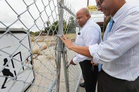 Mayor Dan Rivera, of Lawrence, left, toured potential Amazon sites with another Lawrence official. 
