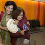 Noemi Santiago greeted her 85-year-old mother, Emilia Acevedo, who arrived at Logan Airport from Puerto Rico.