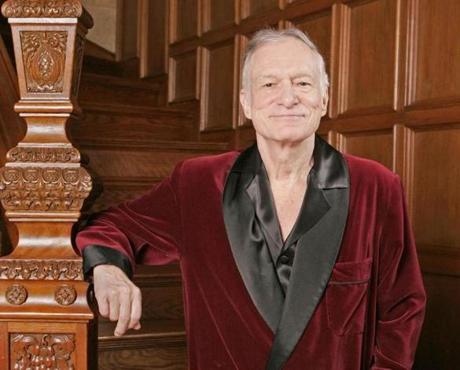 Playboy founder Hugh Hefner poses at the Playboy Mansion in the Holmby Hills area of Los Angeles in April 2006.
