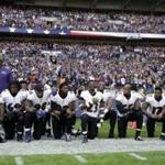 Baltimore Ravens players took a knee during the playing of the US national anthem before an NFL game Sunday. 