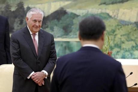 US Secretary of State Rex Tillerson, left, looked at Chinese President Xi Jinping during a meeting in Beijing Saturday. 
