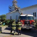 The Rockport Fire Department worked to rescue a worker who had fallen in the steeple of the First Congregational Church in Rockport Friday.