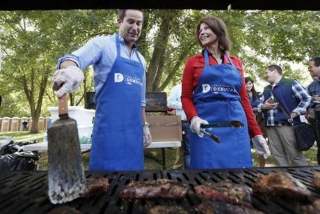 US Representative Seth Moulton flipped steaks Saturday during the Polk County Democrats Steak Fry.
