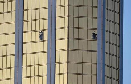 LAS VEGAS SLIDER2 LAS VEGAS, NV - OCTOBER 02: Broken windows are seen on the 32nd floor of the Mandalay Bay Resort and Casino after a lone gunman opened fired on the Route 91 Harvest country music festival on October 2, 2017 in Las Vegas, Nevada. The gunman, identified as Stephen Paddock, 64, of Mesquite, Nevada, opened fire from the Mandalay Bay Resort and Casino on the music festival, leaving at least 50 people dead and hundreds injured. Police have confirmed that one suspect has been shot. The investigation is ongoing. (Photo by David Becker/Getty Images)
