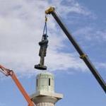 A statue of Confederate General Robert E. Lee is removed from Lee Circle in New Orleans earlier this year. 