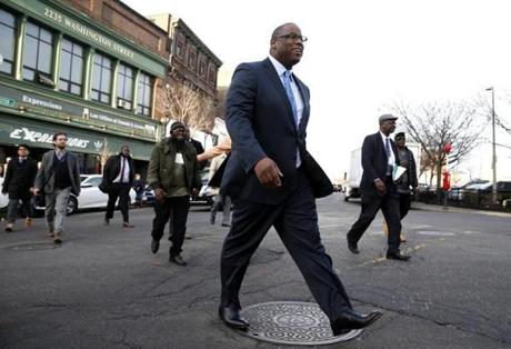 Tito Jackson walked through Dudley Square in January, after annoucing that he was running for mayor.

