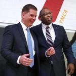 Boston Mayor Marty Walsh and Councilor Tito Jackson share a light moment at the annual MLK Breakfast at the Roxbury YMCA. 