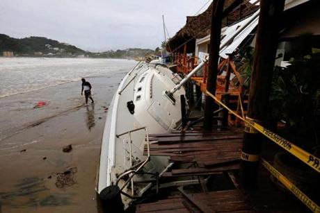TOPSHOT - View of damages in San Juan del Sur beach, following the passage of Tropical Storm Nate, in Rivas, Nicaragua, on October 6, 2017. Tropical Storm Nate gained strength as it headed toward popular Mexican beach resorts and ultimately the US Gulf coast after dumping heavy rains in Central America that left at least 22 people dead. / AFP PHOTO / INTI OCONINTI OCON/AFP/Getty Images
