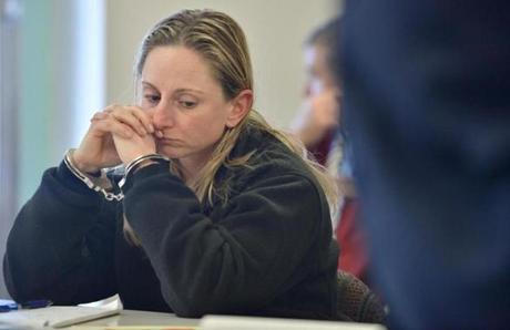 Jennifer Garvey, then a T police officer, appeared in Woburn District Court in 2015 after a domestic dispute.
