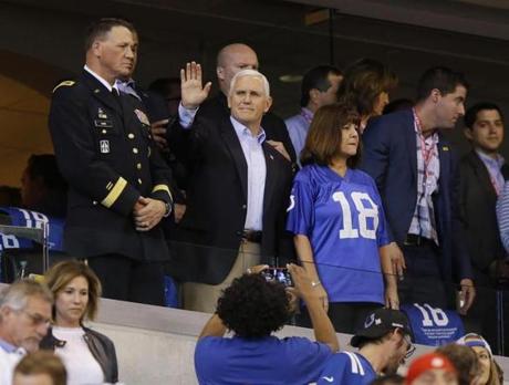 Vice President Mike Pence waves to fans before an NFL football game between the Indianapolis Colts and the San Francisco 49ers, Sunday, Oct. 8, 2017, in Indianapolis. (AP Photo/Michael Conroy)
