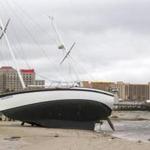 BILOXI, MS - OCTOBER 8: A large sailboat is washed ashore on a Biloxi beach near the Haarahs and Golden Nugget casinos by Hurricane Nate on October 8, 2017 in Biloxi, Mississippi. Hurricane Nate made it's second landfall along the north Mississippi Gulf Coast as a category 1 hurricane Sunday before weakening to a tropical storm. (Photo by Mark Wallheiser/Getty Images)