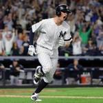 NEW YORK, NY - OCTOBER 08: Greg Bird #33 of the New York Yankees celebrates after hitting a solo-homerun during the seventh inning against the Cleveland Indians in game three of the American League Division Series at Yankee Stadium on October 8, 2017 in New York City. (Photo by Abbie Parr/Getty Images)
