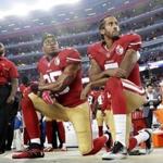 FILE - Int his Monday, Sept. 12, 2016, file photo, San Francisco 49ers safety Eric Reid (35) and quarterback Colin Kaepernick (7) kneel during the national anthem before an NFL football game against the Los Angeles Rams in Santa Clara, Calif. Reid has resumed his kneeling protest for human rights during the national anthem, after joining then-teammate Kaepernick's polarizing demonstration last season. (AP Photo/Marcio Jose Sanchez, File)