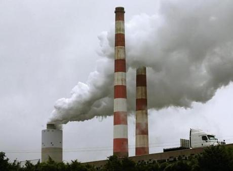 Emissions spewed out of a large stack at the coal-fired Morgantown Generating Station, in Newburg, Md., in 2014. 
