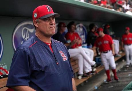 Fort Myers, FL - 2/23/2017 - Boston Red Sox manager John Farrell (53) watching from the dugout during today's game against the Northeastern Huskies. Red Sox Spring Training. Red Sox vs. Northeastern University Huskies. Day Eleven at Jet Blue Park in Fort Myers, FL. - (), Section: Sports, Reporter: Peter Abraham, Topic: 24Red Sox, LOID: 8.3.1673334524.
