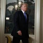 President Donald Trump arrived to deliver a statement on Iran policy in the Diplomatic Reception Room of the White House on Friday.