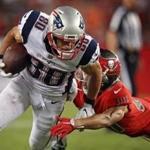 Tampa, FL: October 5, 2017: Patriots WR Danny Amendola picks up a late second quarter first down after hauling in a pass from Tom Brady. The New England Patriots visited the Tampa Bay Buccaneers in a regular season Thursday Night NFL football game at Raymond James Stadium. (Jim Davis/Globe Staff).