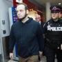 Joshua Boyle (left) departed the Toronto airport after speaking to the media Friday.