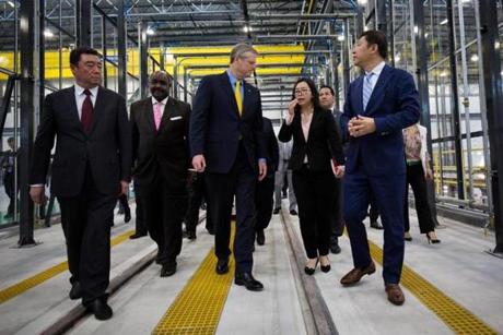 Massachusetts Governor Charlie Baker (center, below) joined CRRC executives last Thursday during a tour of the Springfield factory where MBTA cars will be built.
