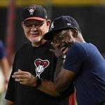 PHOENIX, AZ - JULY 24: Third base coach Ron Washington #37 of the Atlanta Braves has some laughs with bench coach Ron Gardenhire #35 of the Arizona Diamondbacks prior to a game at Chase Field on July 24, 2017 in Phoenix, Arizona. (Photo by Norm Hall/Getty Images)