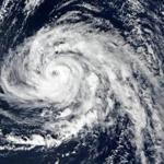 This handout satellite image captured on October 13, 2017 by the Visible Infrared Imaging Radiometer Suite (VIIRS) on the Suomi NPP and released by NASA Earth Observatory on October 15, 2017 shows hurricane Ophelia approaching the Azores islands in the Atlantic Ocean. Hurricane Ophelia strengthened to a Category 3 storm as it passed near the Portuguese Azores archipelago on Octoer 14 on route for Ireland. Five counties in the west of Ireland will be placed on red alert for 