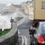 A woman recorded Ophelia battering the Atlantic coast in Lahinch village, County Clare, Ireland. 