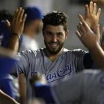 Kansas City Royals' Eric Hosmer celebrates with teammates after scoring a run against Chicago White Sox during the fourth inning of a baseball game Saturday, Sept. 23, 2017, in Chicago. (AP Photo/Jim Young)