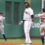 Boston, MA: October 8, 2017: Red Sox DH Hanley Ramirez reacts to his teammates in the dugout follolwing his bottom of the third inning RBI double. The Boston Red Sox hosted the Houston Astros in Game Three of an ALDS baseball game at Fenway Park. (Jim Davis/Globe Staff). 