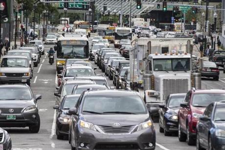 The report predicts vehicle traffic in Boston could decrease between 11 percent and 28 percent, and average travel time for commuters could fall anywhere from 11 percent to 30 percent. 
